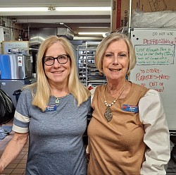 Jane  our Treasurer and Diane H our president  go to Wildwood Soup Kitchen to donate $500